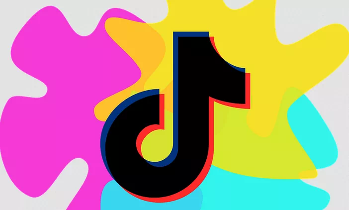 Logo TikTok sur fond coloré