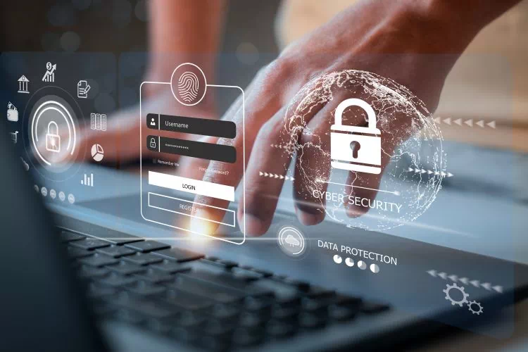 Personne s'identifiant sur son ordinateur avec un login et mot de passe